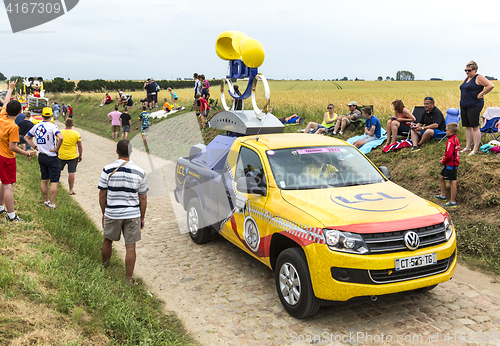 Image of LCL Vehicle on a Cobblestone Road- Tour de France 2015