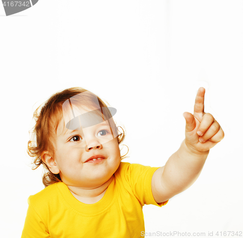 Image of little cute baby girl pointing isolated on white 