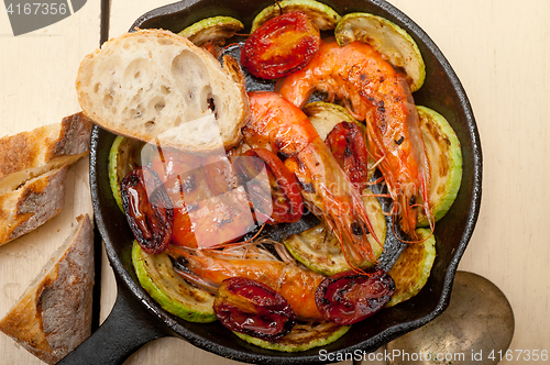 Image of roasted shrimps with zucchini and tomatoes