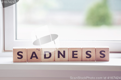 Image of Sadness word made of wood