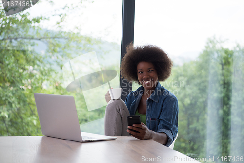 Image of African American woman in the living room