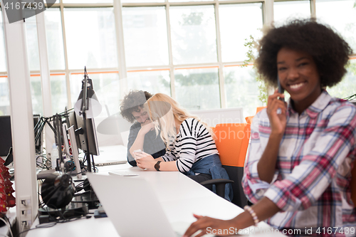 Image of African American informal business woman working in the office