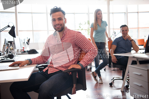 Image of Portrait of young informal businessman