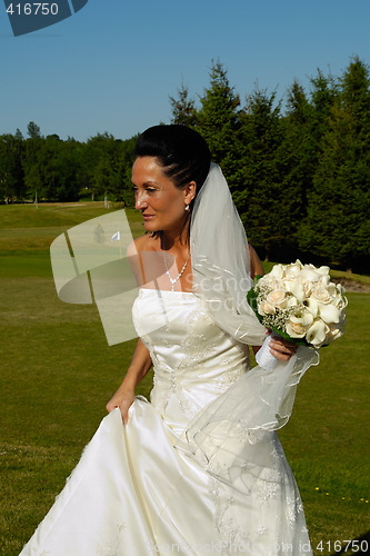 Image of Bride with flower bouquet