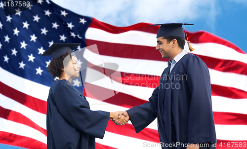 Image of happy students or bachelors greeting each other