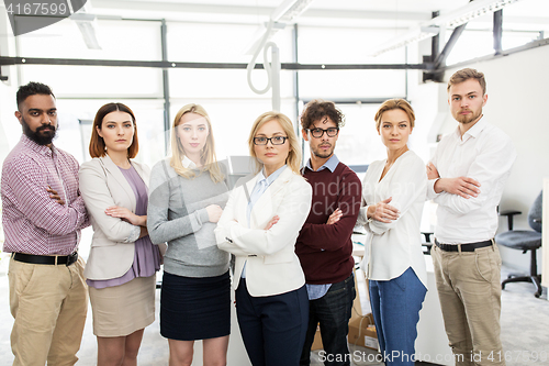 Image of happy business team in office