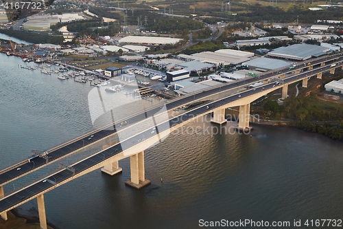 Image of Highway bridge over river, aerial view