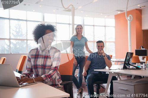 Image of African American informal business woman working in the office