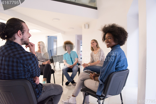 Image of Multiethnic startup business team on meeting