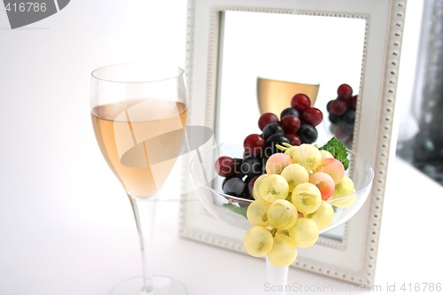 Image of Isolated Grapes In a Glass