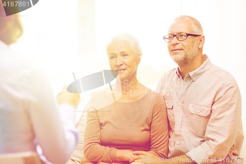 Image of happy senior couple at home