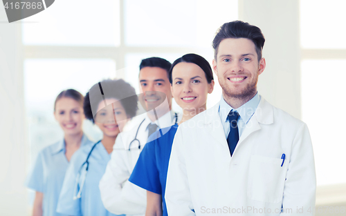 Image of group of happy doctors at hospital