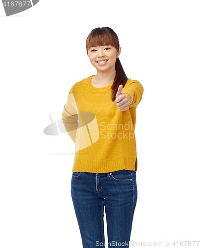 Image of happy asian woman showing thumbs up