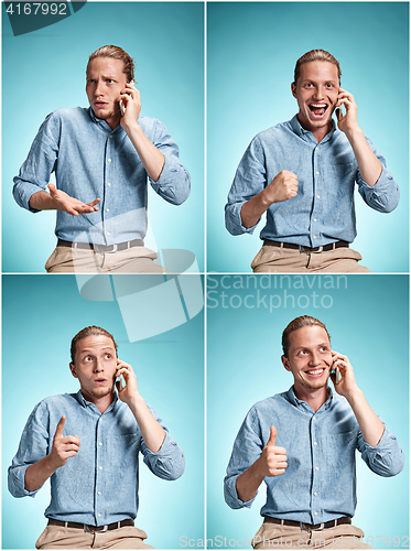 Image of The young smiling caucasian man on blue background