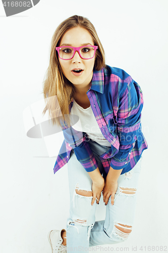 Image of young pretty teenage hipster girl posing emotional happy smiling on white background, lifestyle people concept