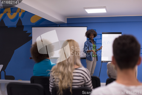 Image of Black woman Speaker Seminar Corporate Business Meeting Concept