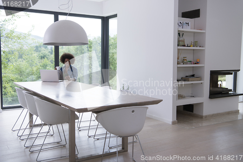 Image of African American woman in the living room