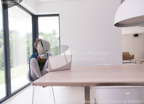 Image of African American woman in the living room