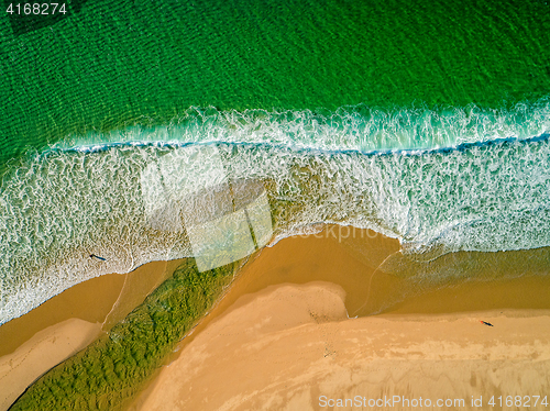 Image of Aerial View Amazing Seascape with Small Waves on Sandy Beach