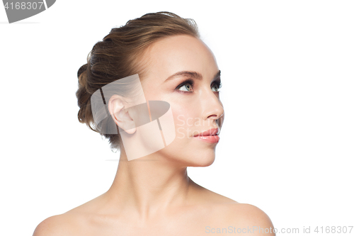 Image of beautiful young woman face over white background