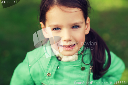 Image of happy beautiful little girl portrait outdoors