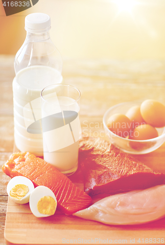 Image of close up of natural protein food on wooden table