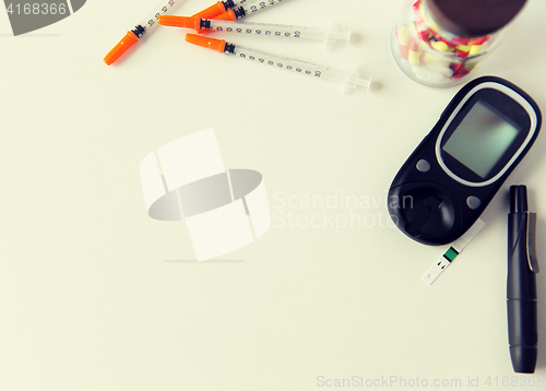 Image of close up of diabedic tools and medication