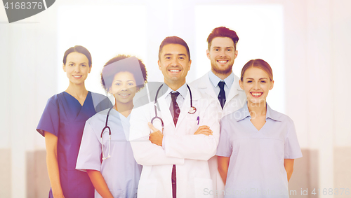 Image of group of happy doctors at hospital