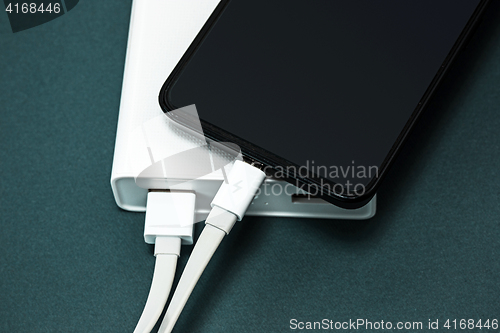 Image of Power bank and mobile phone