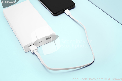 Image of Power bank and mobile phone