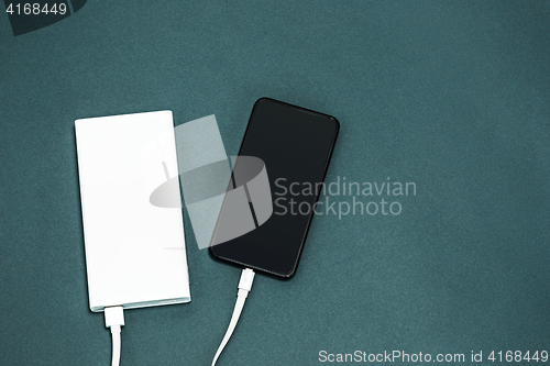 Image of Power bank and mobile phone