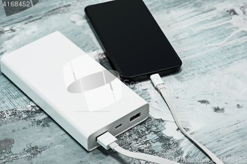 Image of Power bank and mobile phone