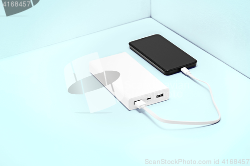 Image of Power bank and mobile phone