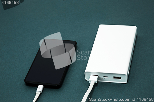 Image of Power bank and mobile phone