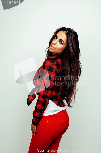 Image of young happy smiling latin american teenage girl emotional posing on white background, lifestyle people concept 