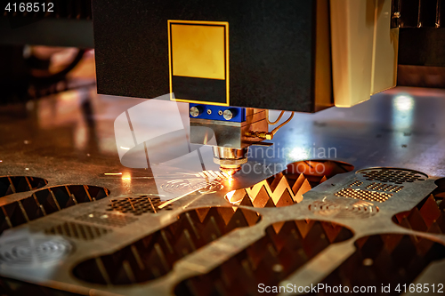 Image of CNC Laser cutting of metal, modern industrial technology. .