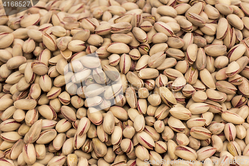 Image of Roasted and salted pistachios as background