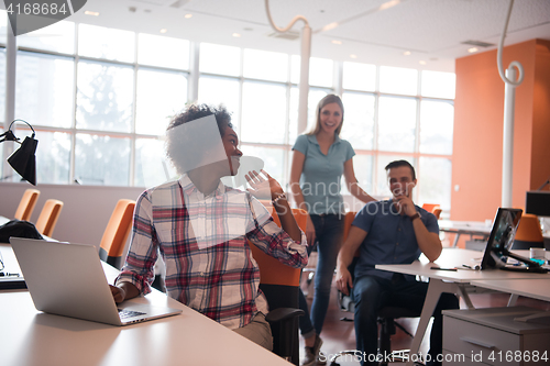 Image of African American informal business woman working in the office