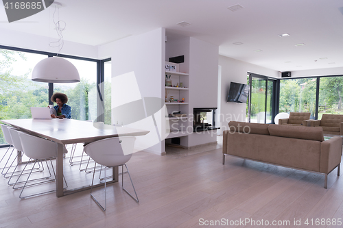 Image of African American woman in the living room