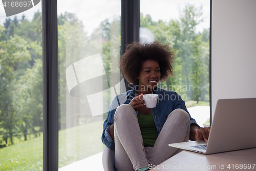 Image of African American woman in the living room