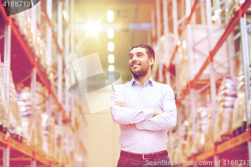 Image of happy man at warehouse