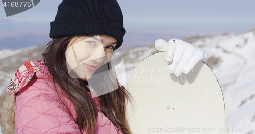 Image of Beautiful asian girl with snowboard