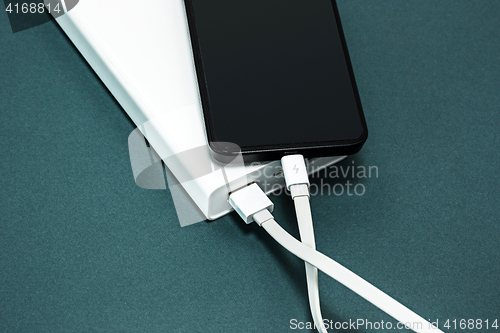 Image of Power bank and mobile phone