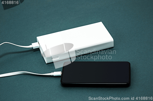 Image of Power bank and mobile phone