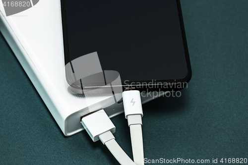 Image of Power bank and mobile phone