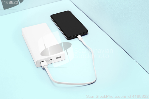 Image of Power bank and mobile phone