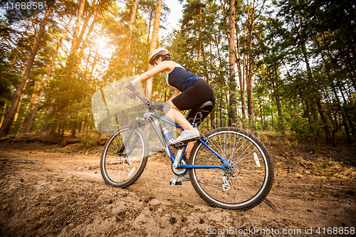 Image of Women on bike