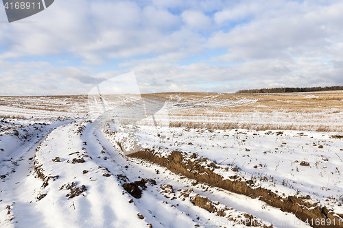 Image of field with snow, the track