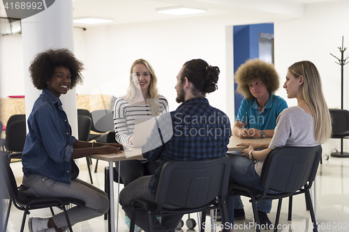 Image of Multiethnic startup business team on meeting