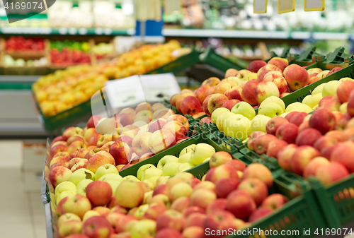 Image of ripe apples at grocery store or market